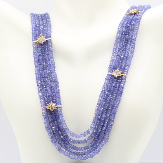 Natural Tanzanite Beaded Necklace featuring stunning blue-violet gemstones and decorative accents.