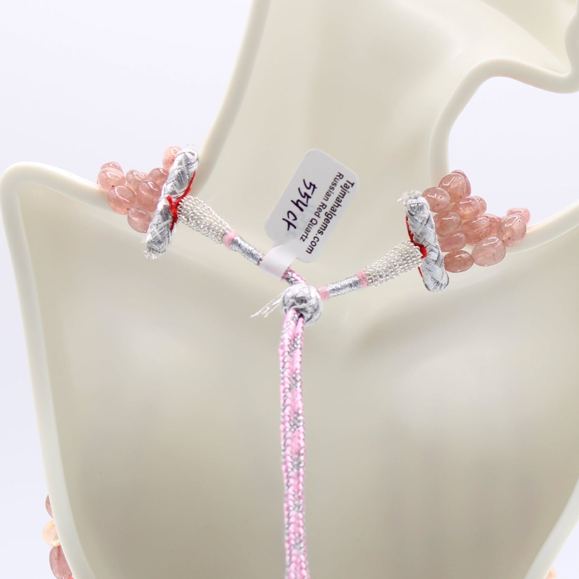 Strawberry Quartz Pearl & Coral - Layered Necklace showing clasp and beads detail on a display mannequin.
