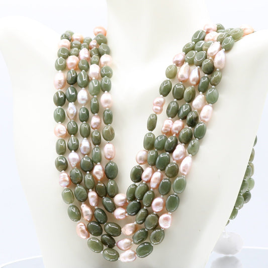 Chrysoberyl With Fresh Water Pearl Necklace featuring green and pink pearls elegantly layered.
