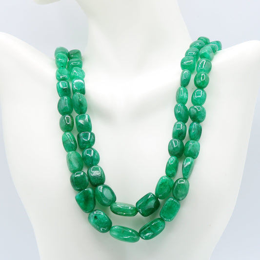 Natural Emerald Nugget Necklace displaying vivid green semitransparent emerald gemstones.