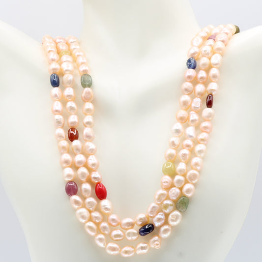 Layered Pearl with Navratna necklace featuring fresh water pearls and vibrant gemstones.