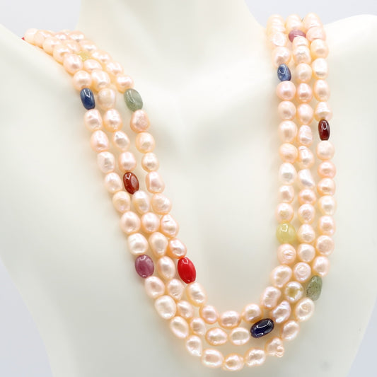 Pearl with Navratna Layered Necklace featuring fresh water pearls and colorful gemstones.