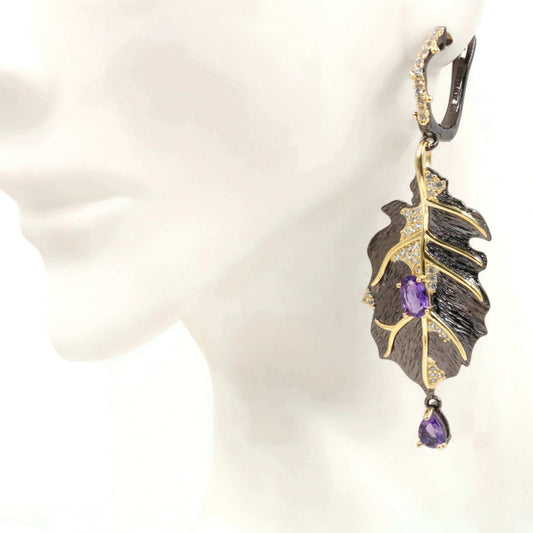 Amethyst Dangle Leaf Earrings 925 sterling silver featuring a gold and black leaf design with amethyst stones.