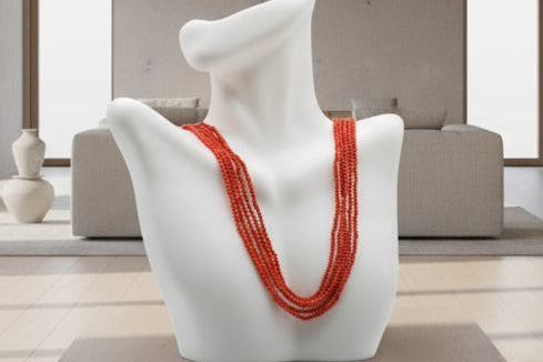 5 strand coral necklace featuring 2mm round reddish orange coral beads, showcasing elegant layers.