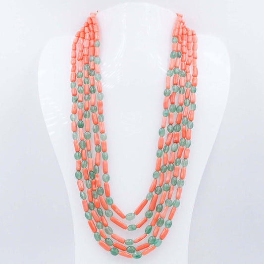 Coral and Aventurine Bead Necklace featuring coral and aventurine beads layered in a stylish multi-strand design.