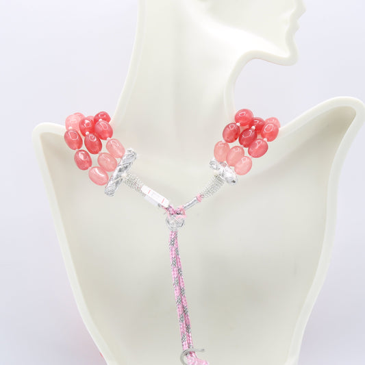 Quartz natural pink quartz bi-color beaded necklace showcased on a mannequin, featuring semi-translucent rounded rectangular beads.