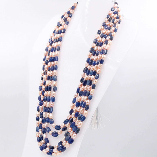 Kyanite with Freshwater Pearl Necklace showcasing stunning blue kyanite and pink freshwater pearls elegantly layered.