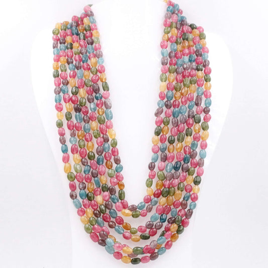 multi-color quartz beaded necklace displayed elegantly on a white bust, showcasing its vibrant colors.