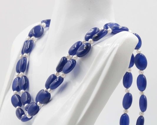 Natural blue quartz pearl necklace displayed on a mannequin, showcasing vibrant blue quartz and elegant pearls.