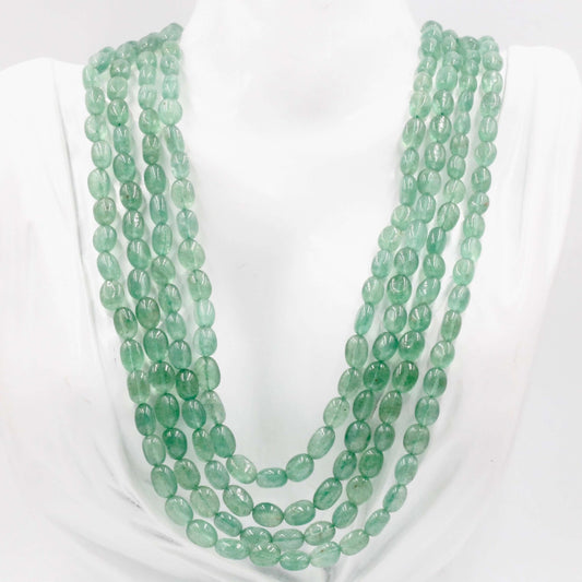 Natural Green Quartz Bead Necklace displayed on a mannequin, showcasing vibrant green quartz beads for energy amplification.