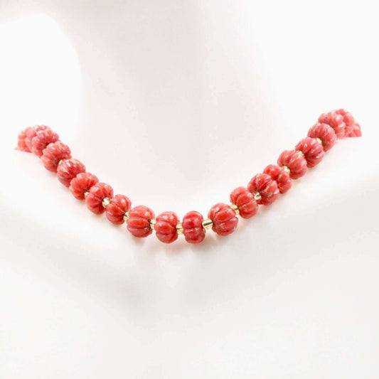Natural red coral beads pumpkin strand necklace showcasing vibrant red coral gemstones.