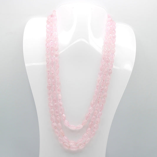 Natural pink Morganite Beaded Necklace displayed on a mannequin, showcasing its light pink color and three strands.