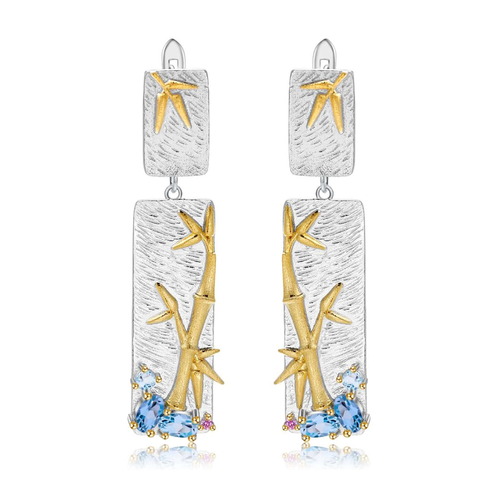 Tree Leaf Statement Earrings with white background