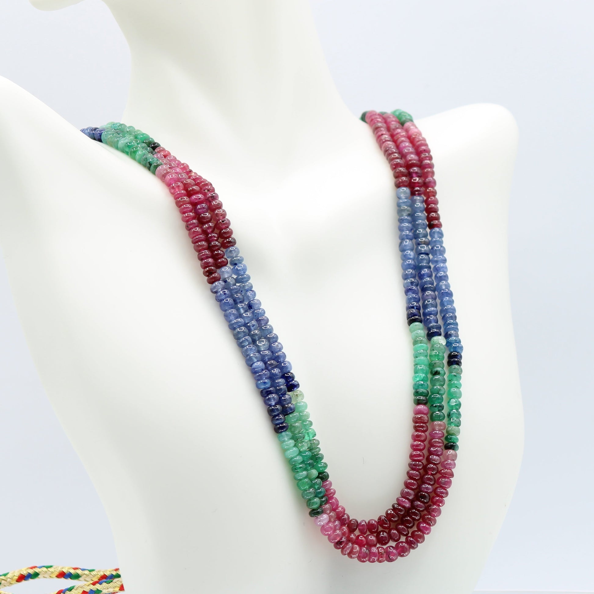 Multi Color Sapphire Beaded Necklace displayed on a mannequin, featuring semi-transparent rondelle beads in vibrant colors.