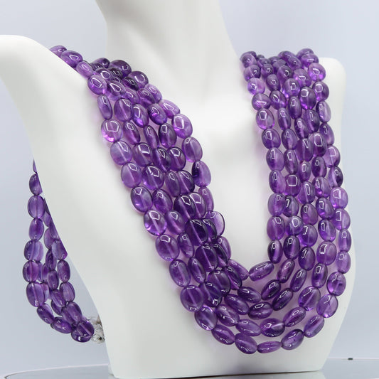 Amethyst Layered Necklace - 5 Strand featuring stunning violet quartz beads for a stylish and protective look.