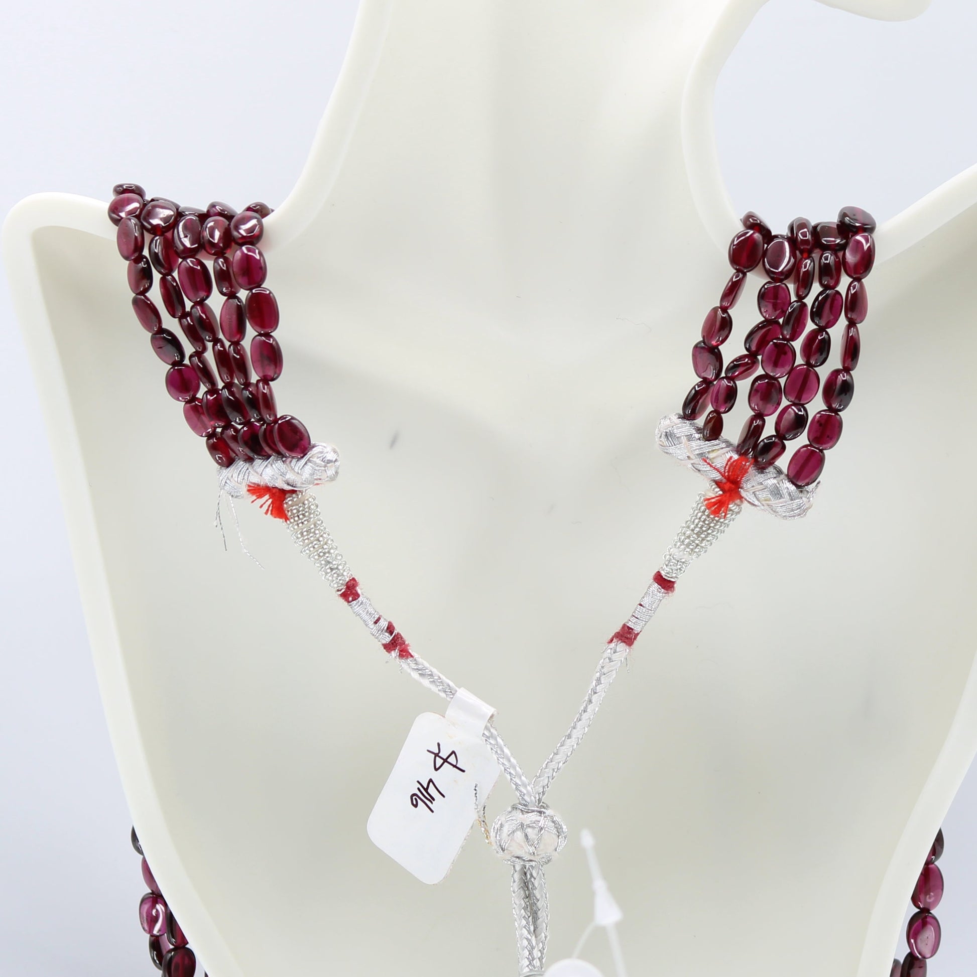 Rhodolite Garnet Smooth Polished Necklace showcasing rose red to pale violet gemstones, perfect for elegant jewelry collections.