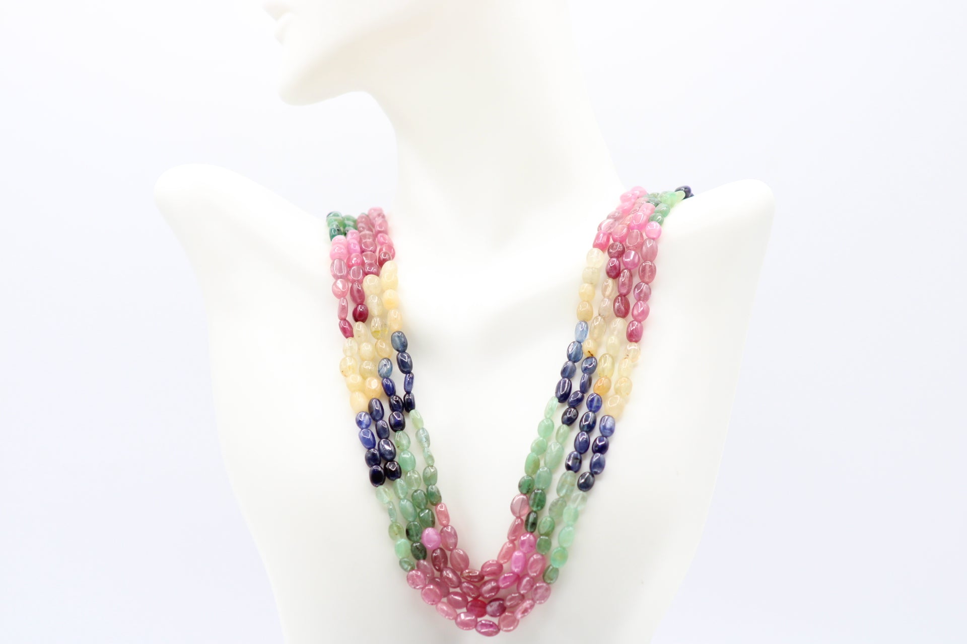 Multi Color Sapphire & Emerald Necklace showcasing vibrant gemstones in a beautiful layered design.