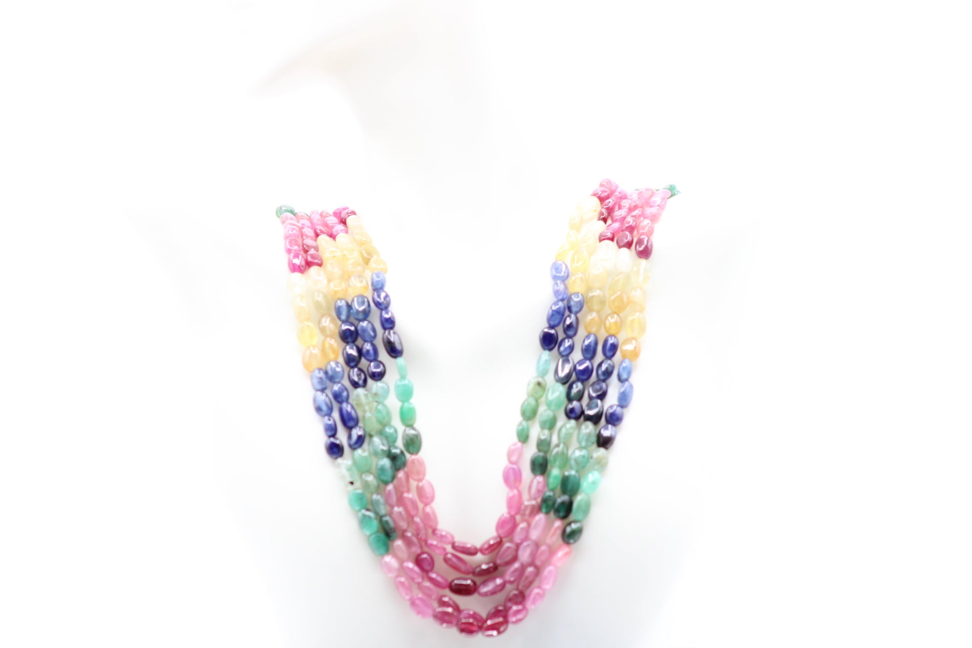 Multi Color Sapphire & Emerald Necklace featuring vibrant gemstones in various shades.
