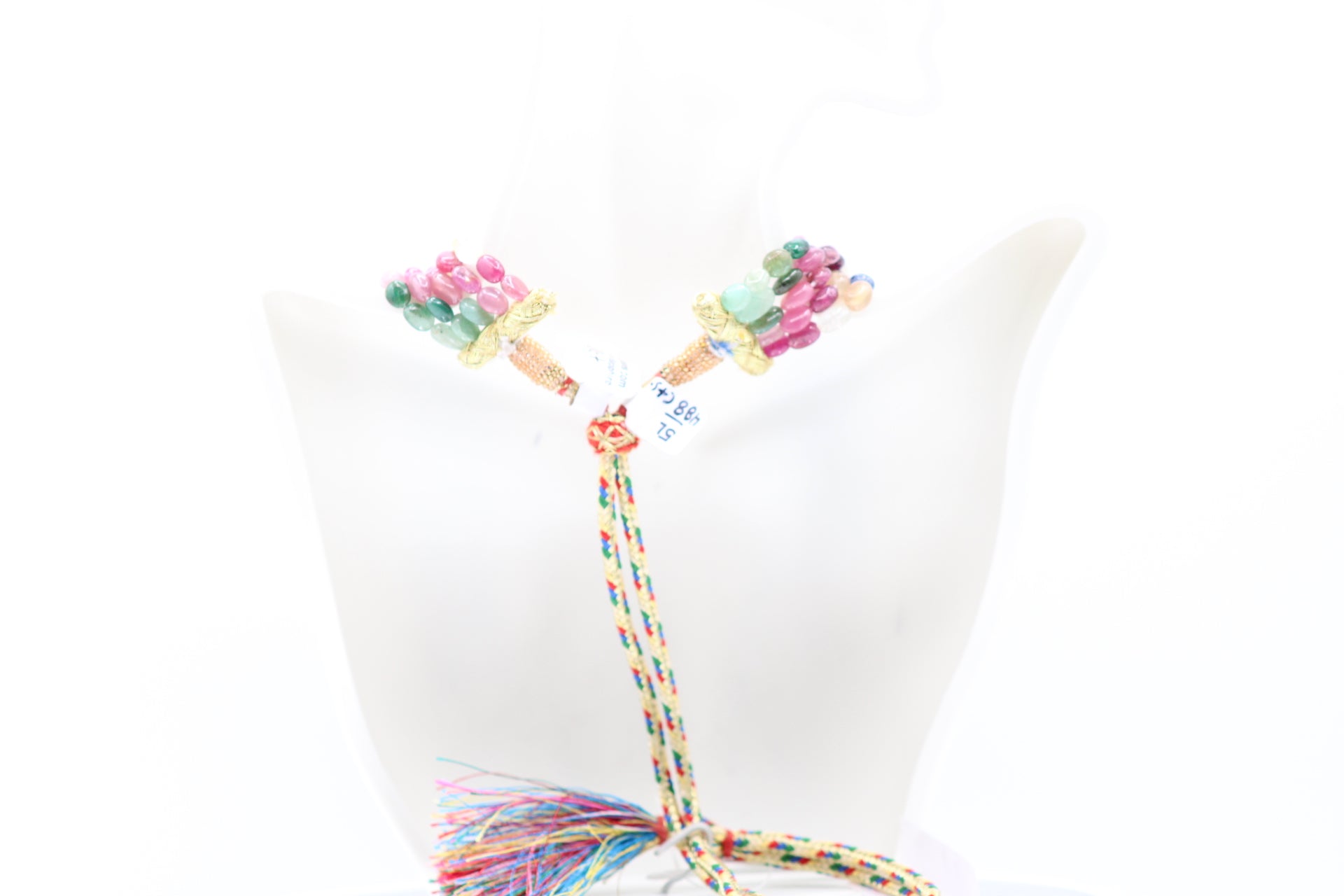 Multi Color Sapphire & Emerald Necklace showcasing vibrant gemstones and intricate design details.