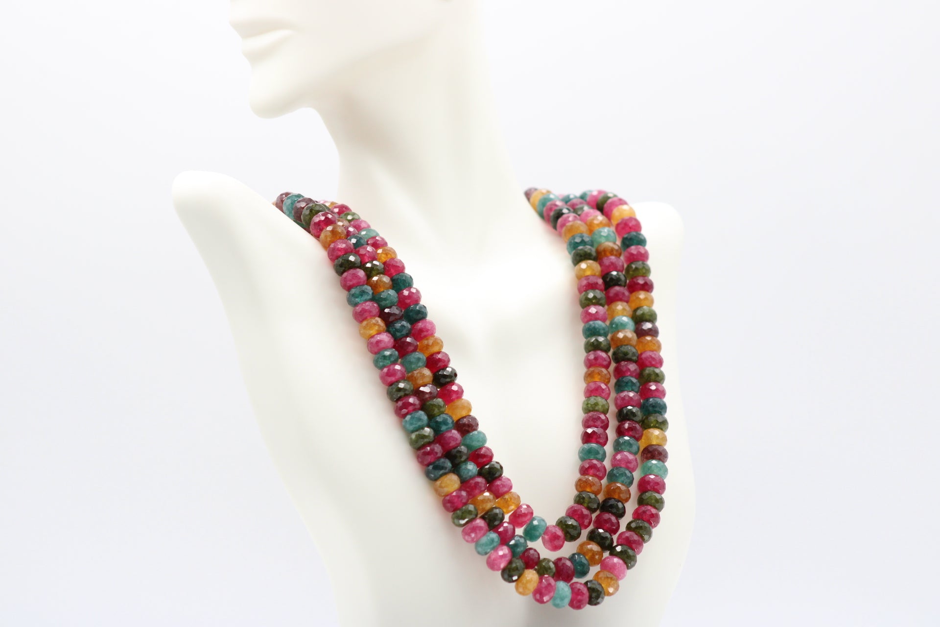 Multi-Color Jade Faceted Necklace displayed on a mannequin showcasing vibrant gemstones in various hues.