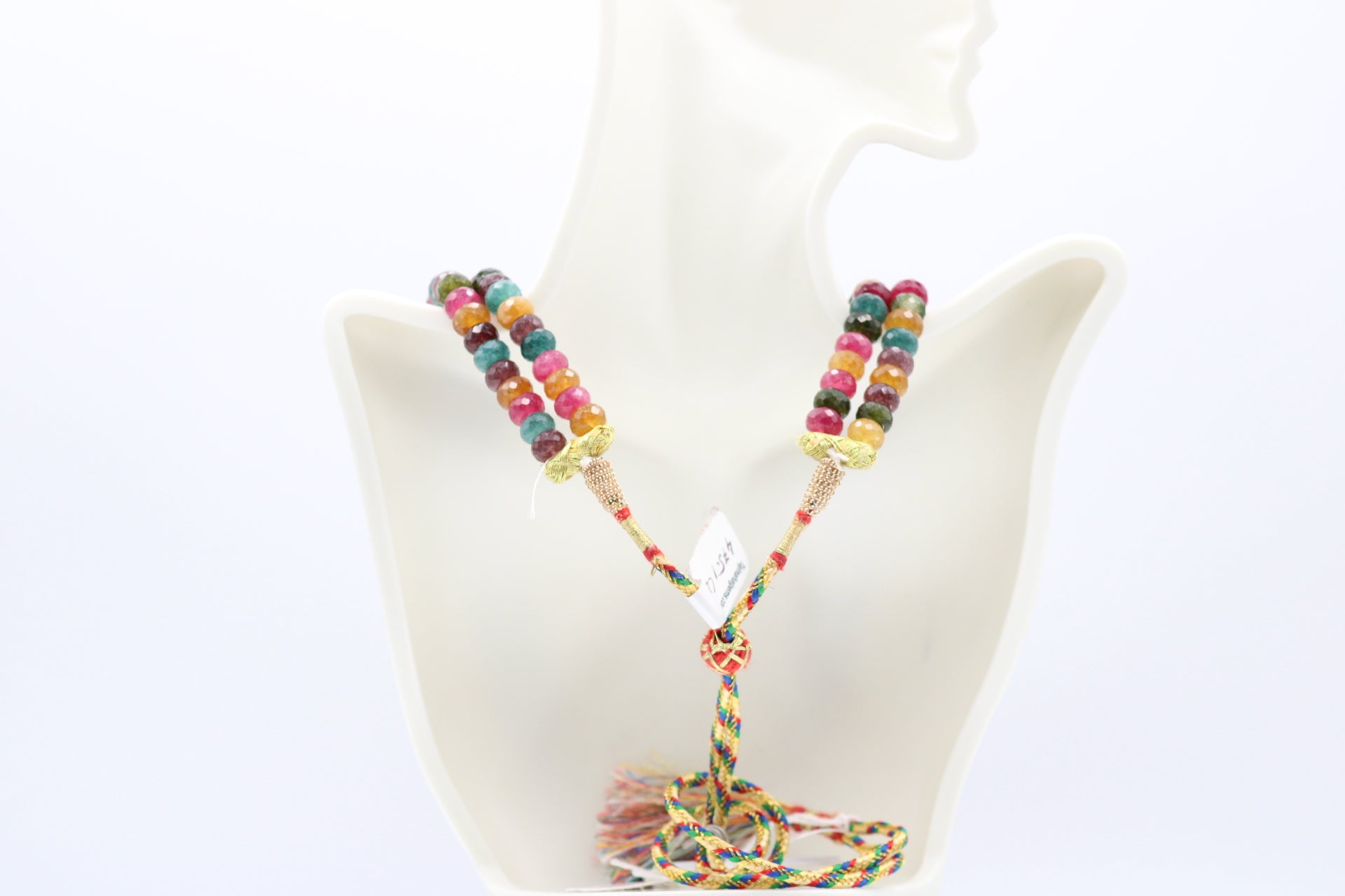 Multi-Color Jade Faceted Necklace showcasing vibrant yellow, blue, red, and green jade gemstones.