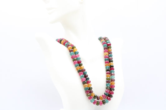 Multi Color Jade & Pearl Necklace showcasing vibrant jade and elegant pearls on a white display mannequin.