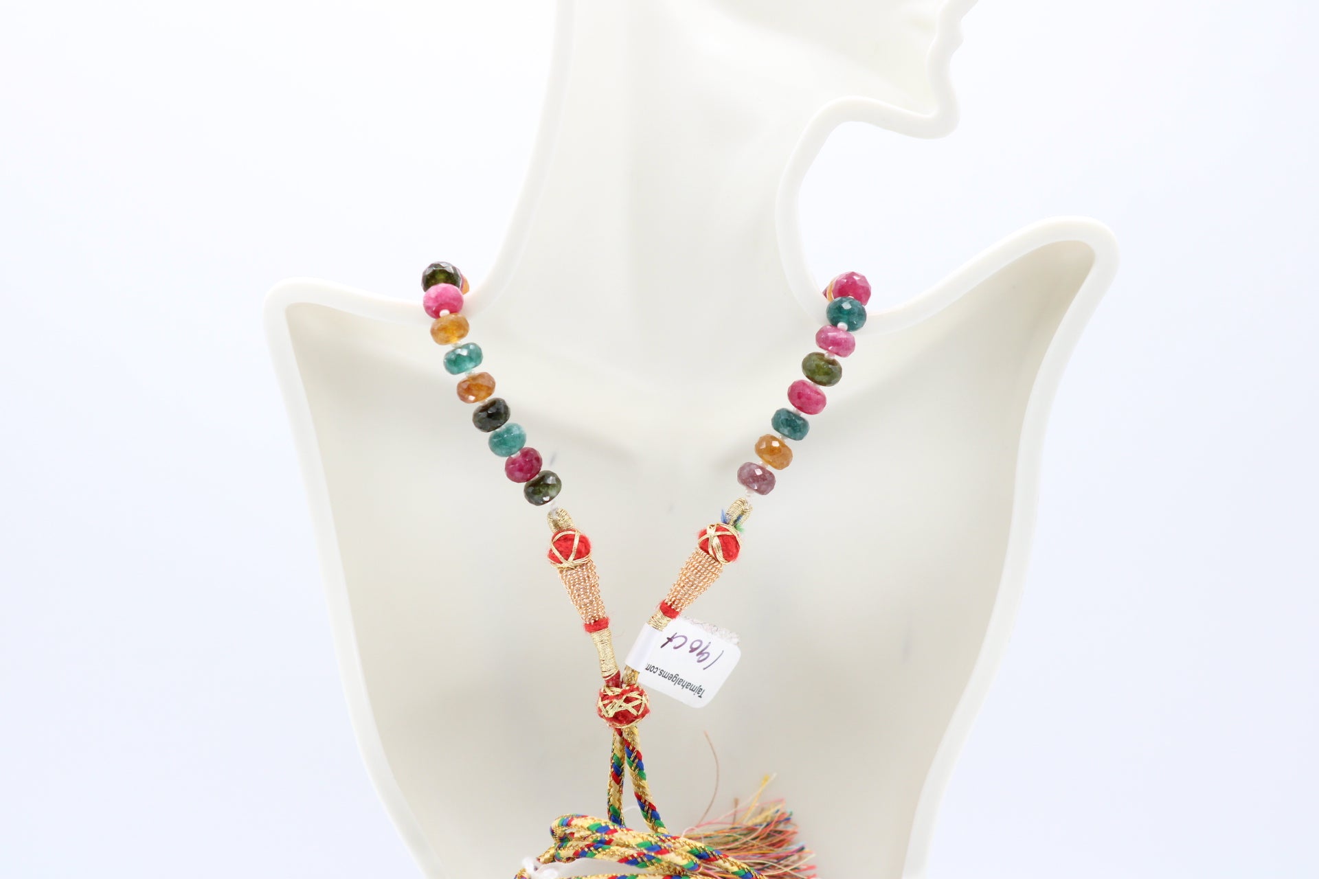 Multi Color Jade & Pearl Necklace displayed on a mannequin, showcasing vibrant gemstones and elegant white pearls.