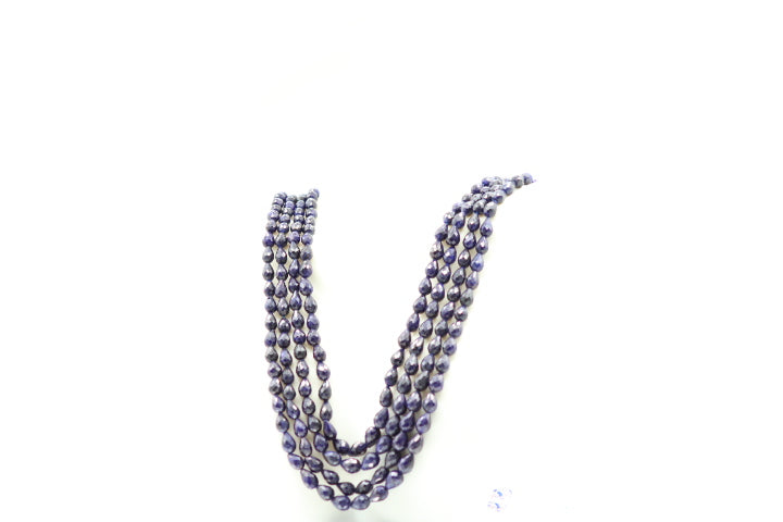 The Blue Sapphire Briolette Pearl Shaped Necklace showcasing elegant blue sapphires in a stunning design.
