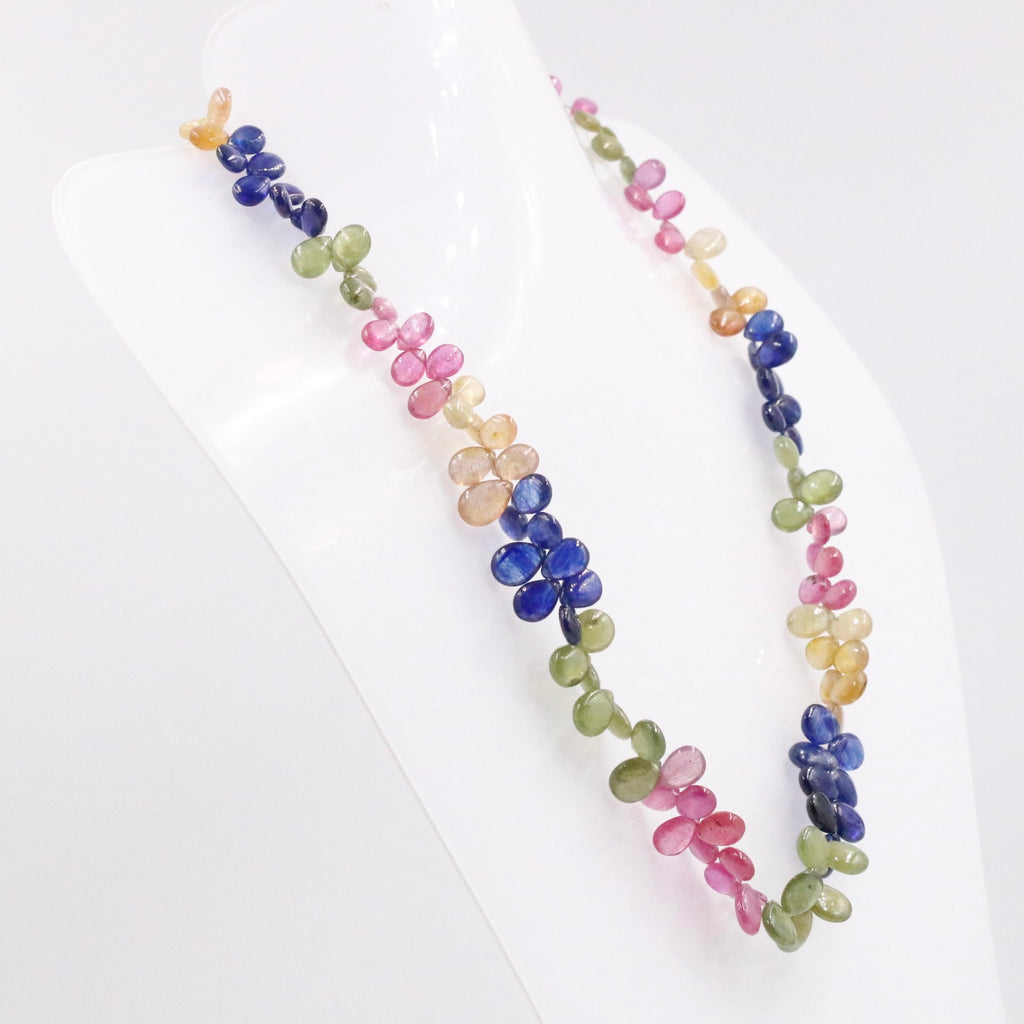 Gemstone drop necklace featuring multicolor sapphires in yellow gold