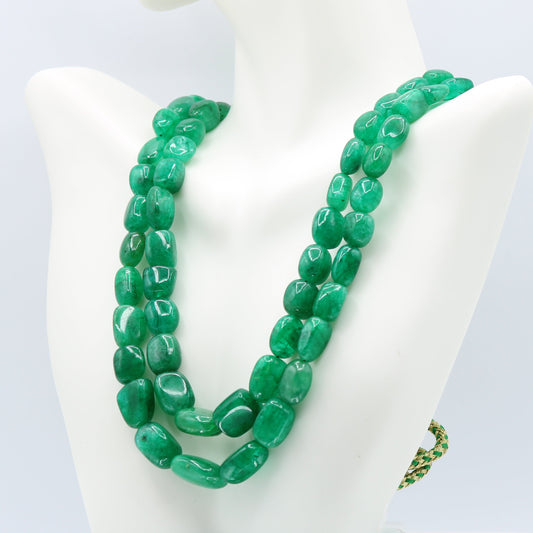Natural Emerald Nugget Necklace showcasing vivid green emerald gemstones in a beautiful nugget shape.