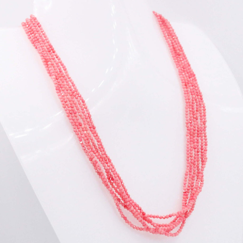Faceted Coral Beads in a Layered Pink Coral Necklace Design