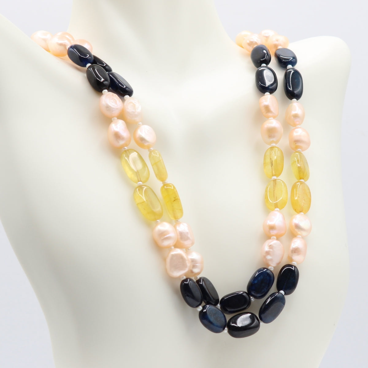 Bi-Color Jade with FWP Necklace showcasing jade and freshwater pearls on a display bust.