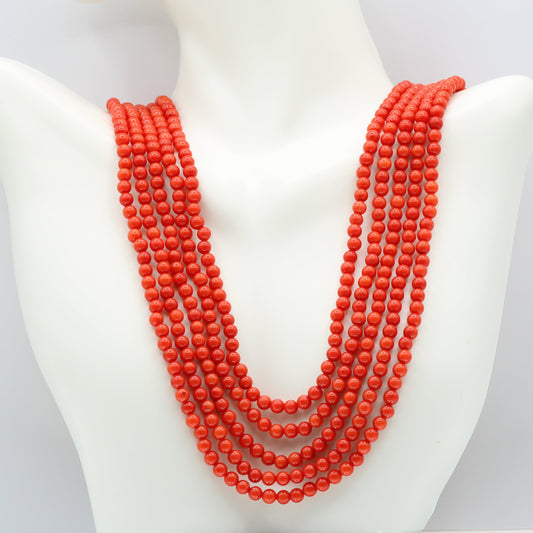 Coral Necklace - Natural Taiwan Coral Layered Necklace displayed on a mannequin with vibrant red beads.