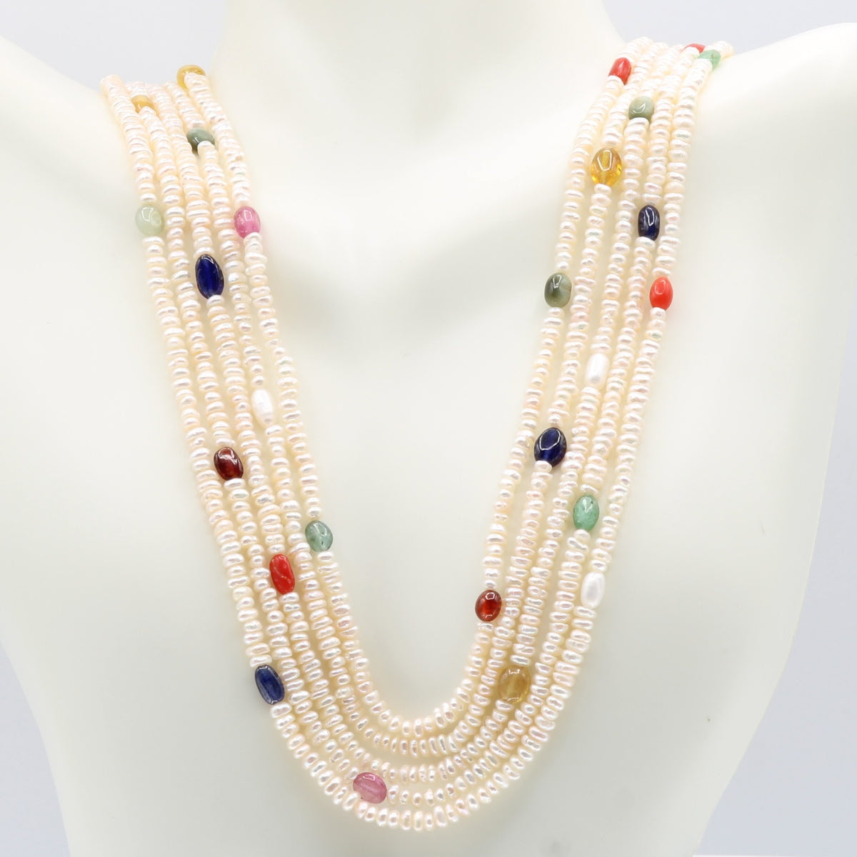 Fresh Water Pearl with Navratna necklace showcasing cultured pearls and colorful gemstone accents.