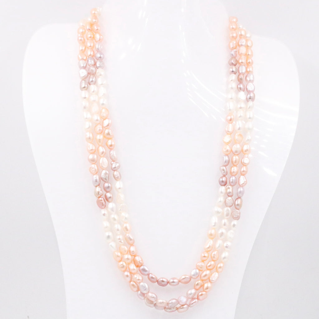 Shaded pearl necklace with multi-strand layered design