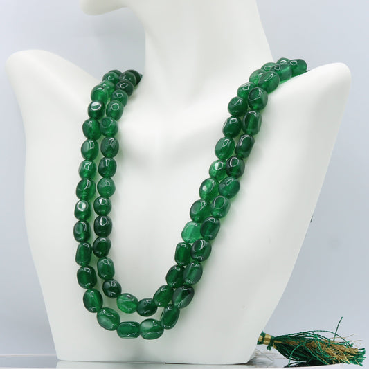 Green Quartz layered necklace displayed on a mannequin bust with vivid green semi-translucent gemstones.