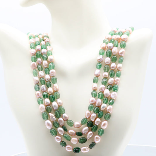 Layered necklace featuring Russian Emerald and pearl beads, perfect for amplifying your energy with elegance.