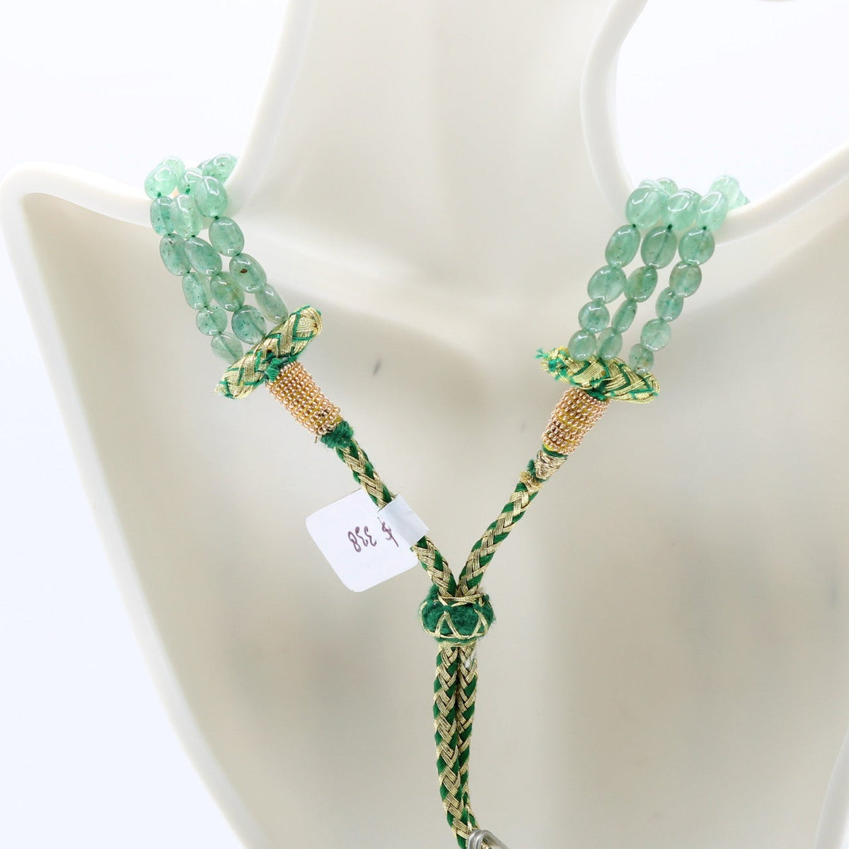 Russian Emerald with Pearl Layered Necklace featuring green quartz beads and intricate braided design.