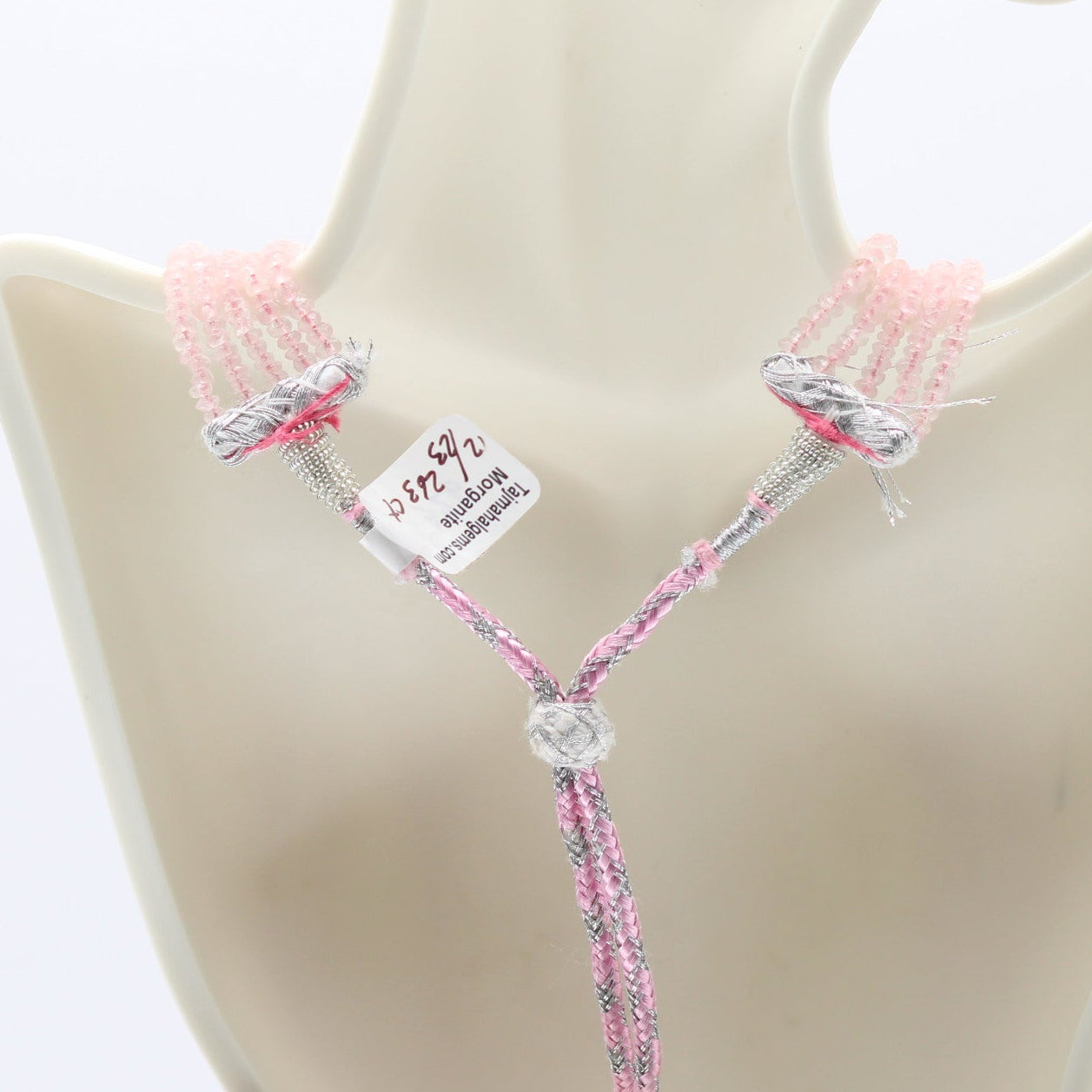 Morganite Faceted Necklace featuring elegant pink beaded design showcased on a jewelry display.