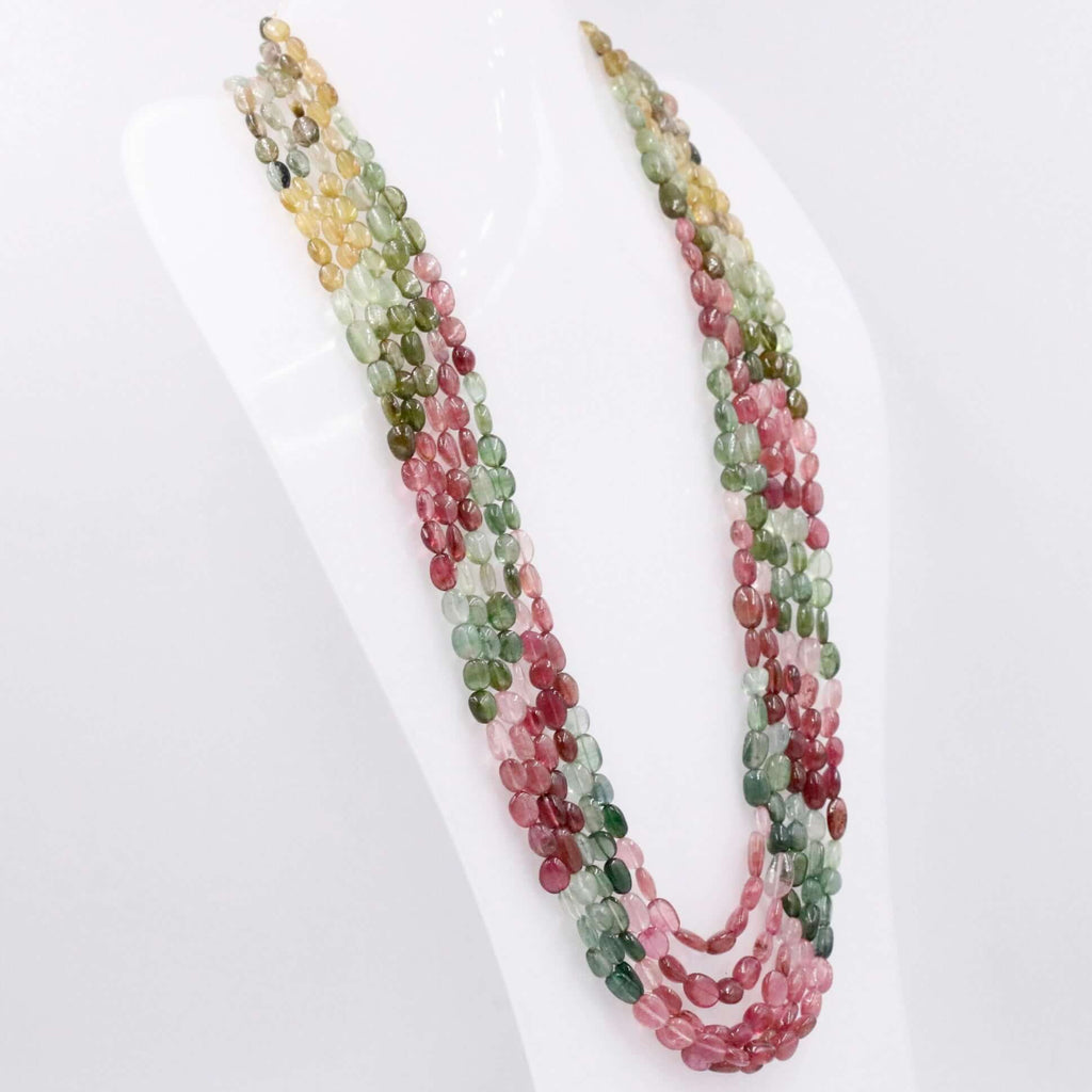 Natural tourmaline necklace with a stylish 5 strand design, perfect for long, layered looks