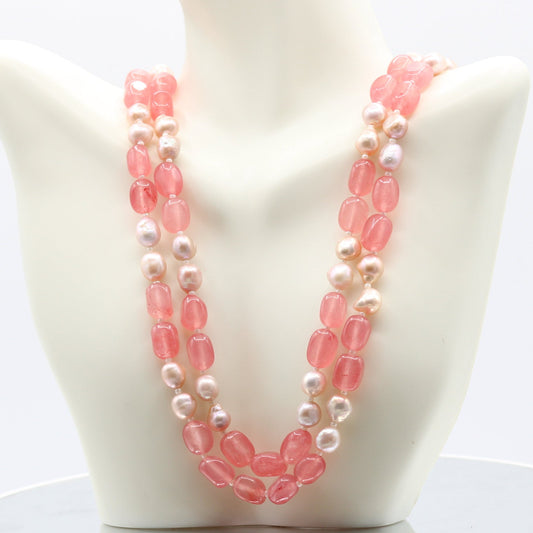 Pink jade with pearl necklace, 2 & 3 strand design showcasing semi-transparent polished gemstones.