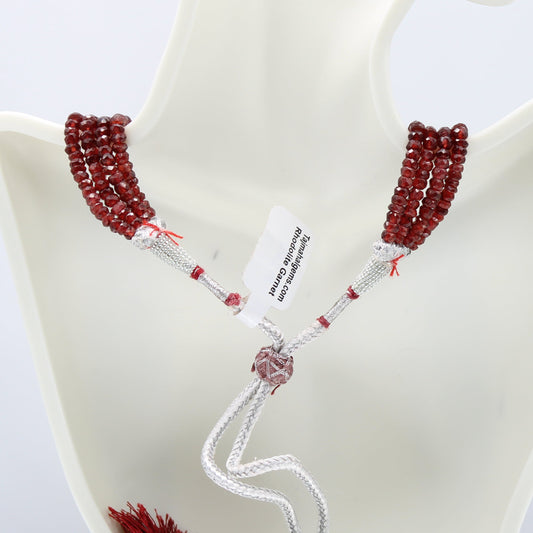Rhodolite Garnet beaded necklace showcasing a 4 strand design with striking rose red color.
