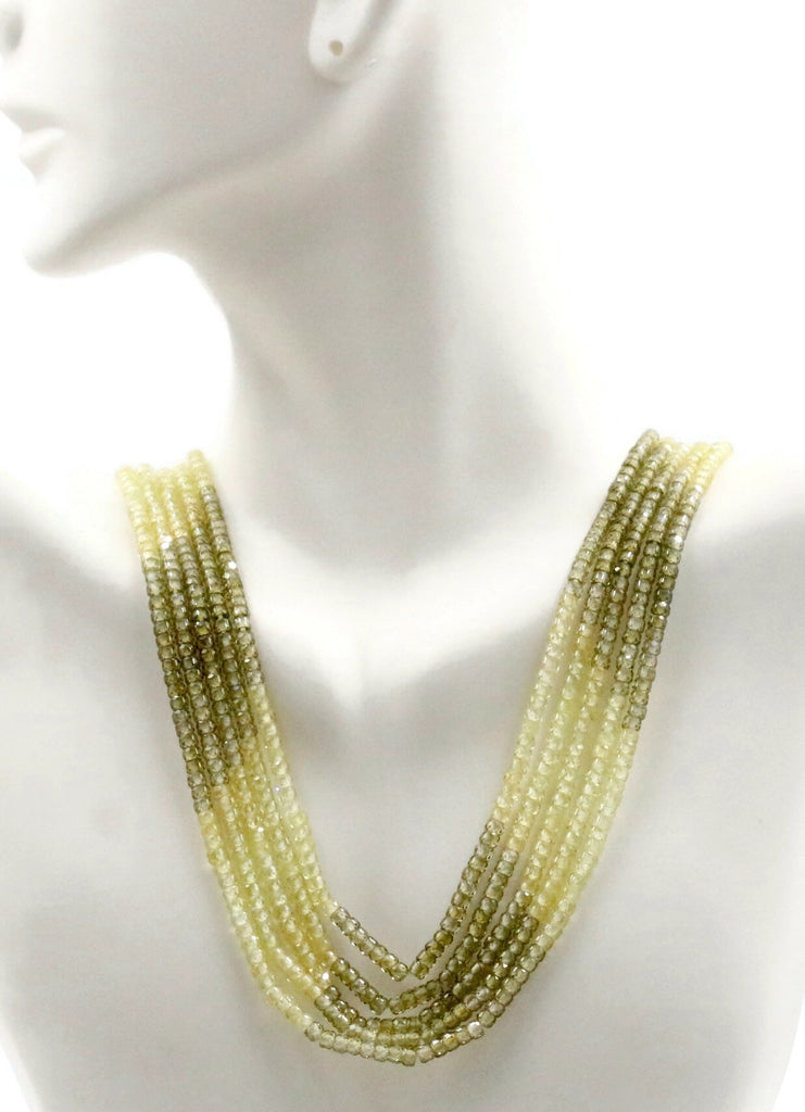 Layered Indian necklace featuring vibrant green CZ beads