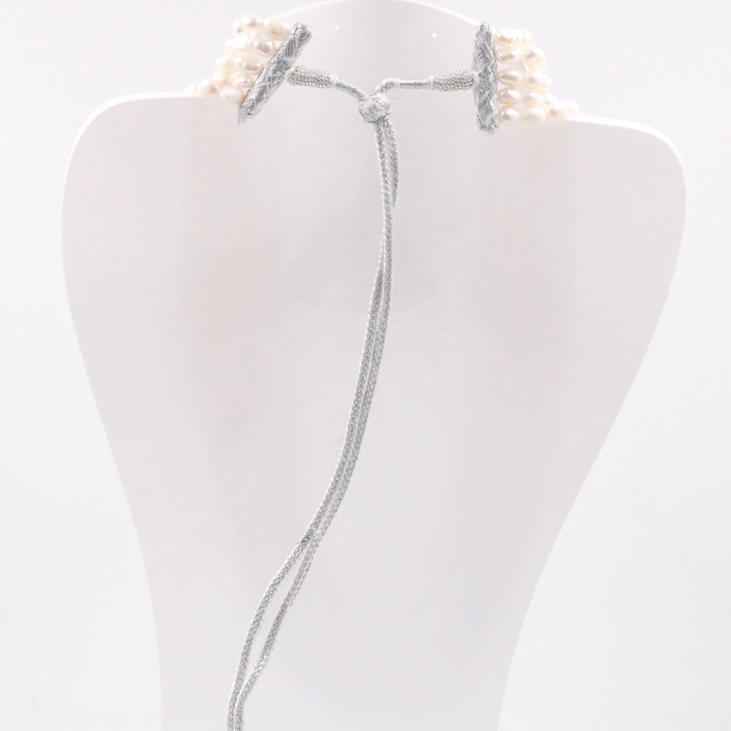 Beaded pearl necklace with shaded cultured pearls in layered strands