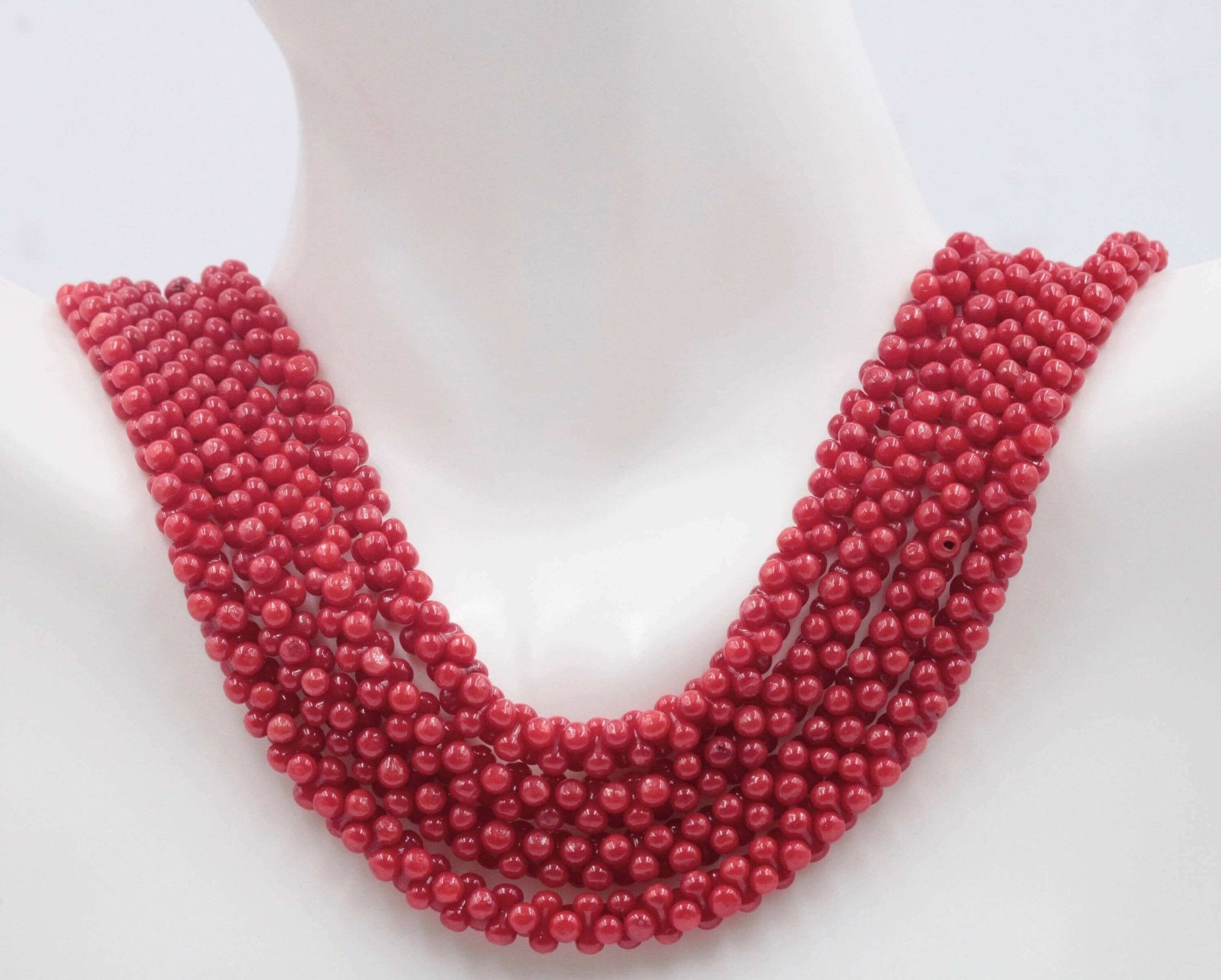 Natural Coral Bead Necklace showcasing multiple strands of vibrant red coral beads, perfect for good luck and fortune.