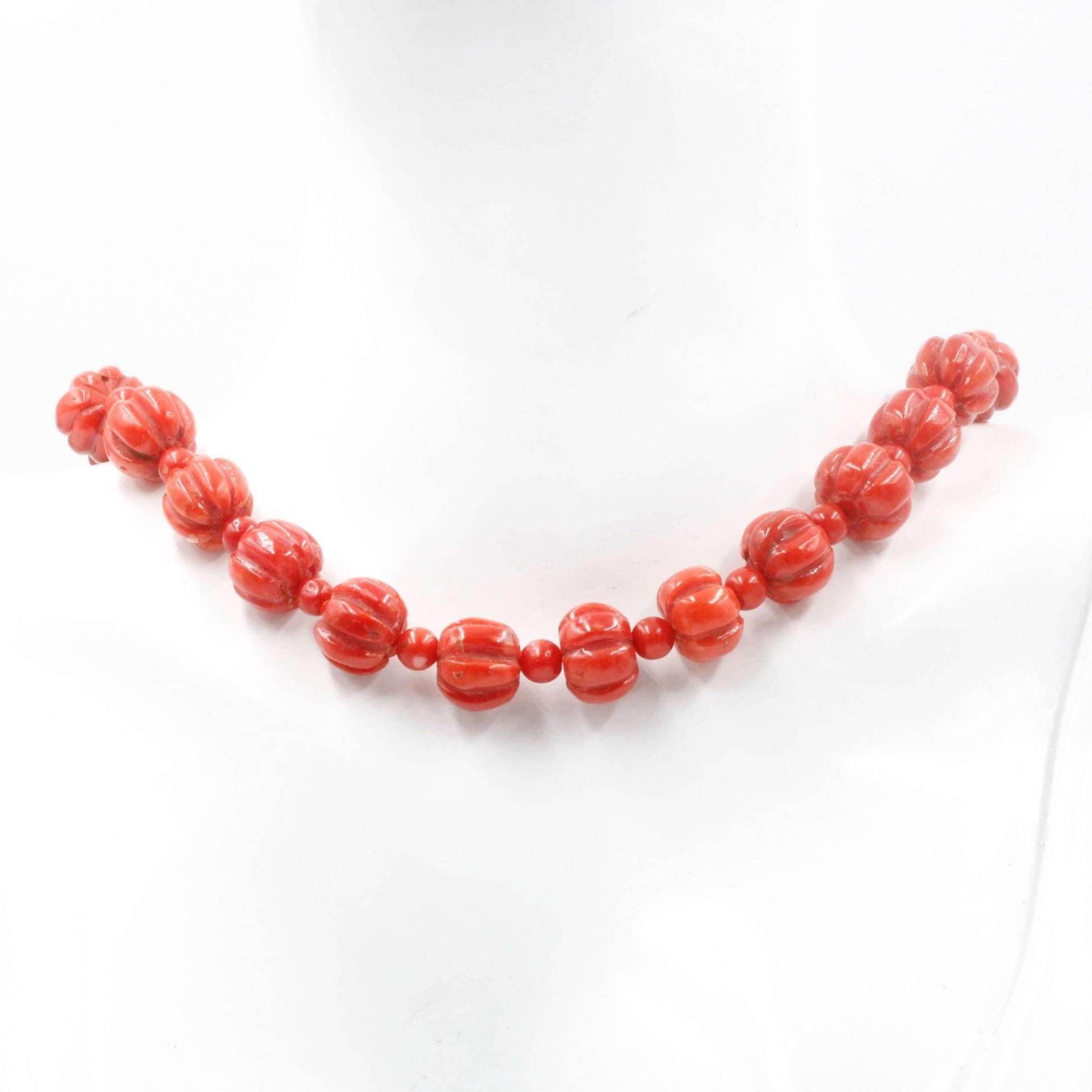 Coral Beads strand featuring Italian natural red coral in a beautiful design, perfect for jewelry lovers.