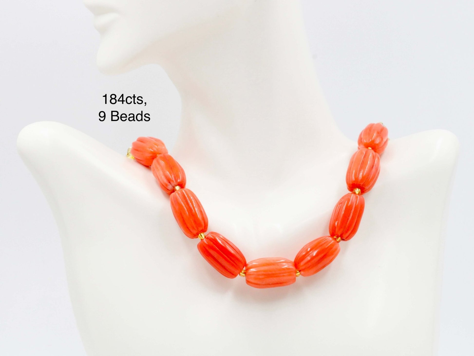 Natural orange coral beads strand necklace showcasing 184cts and 9 beautifully crafted beads.